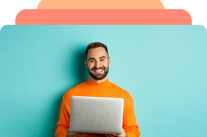 A man holding a laptop